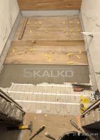 Osadenie podlahového vykurovania v kupeľni - obkladanie